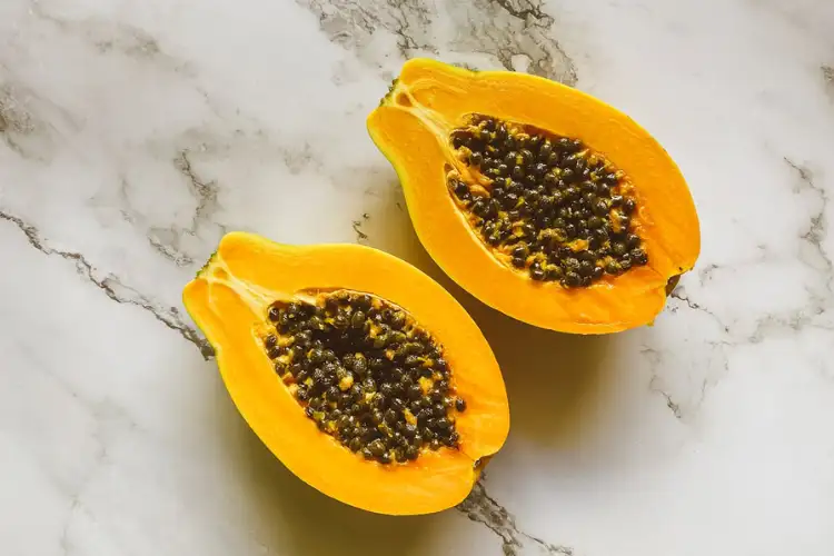 A sliced papaya fruit for skin brightening